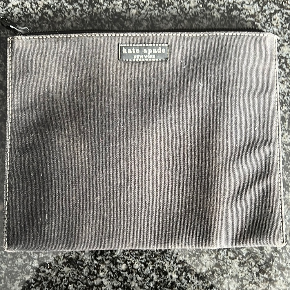 Kate Spade brown rectangular pencil pouch.